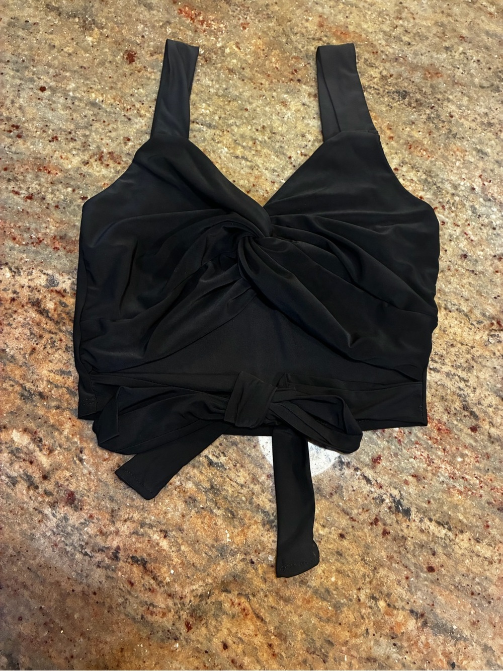 Fashion Nova black twist-front sleeveless crop top with front-tie bow Size: S/XS